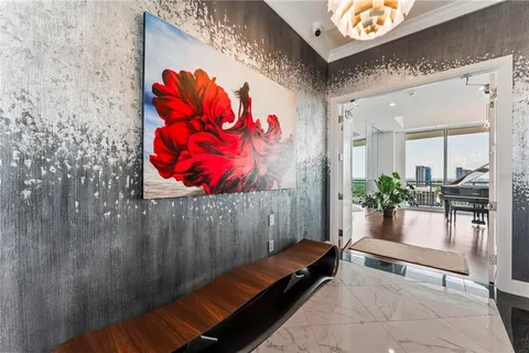 a view of a balcony with wooden fence