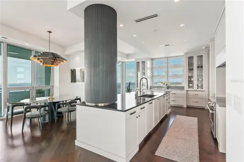 a view of a balcony with chairs