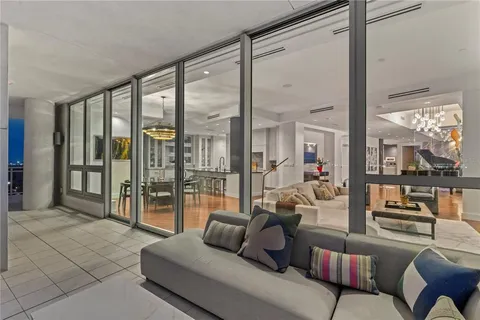 a lobby with furniture and wooden floor