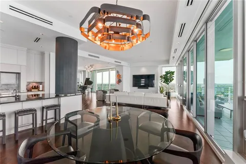 a bathroom with a sink toilet vanity and shower