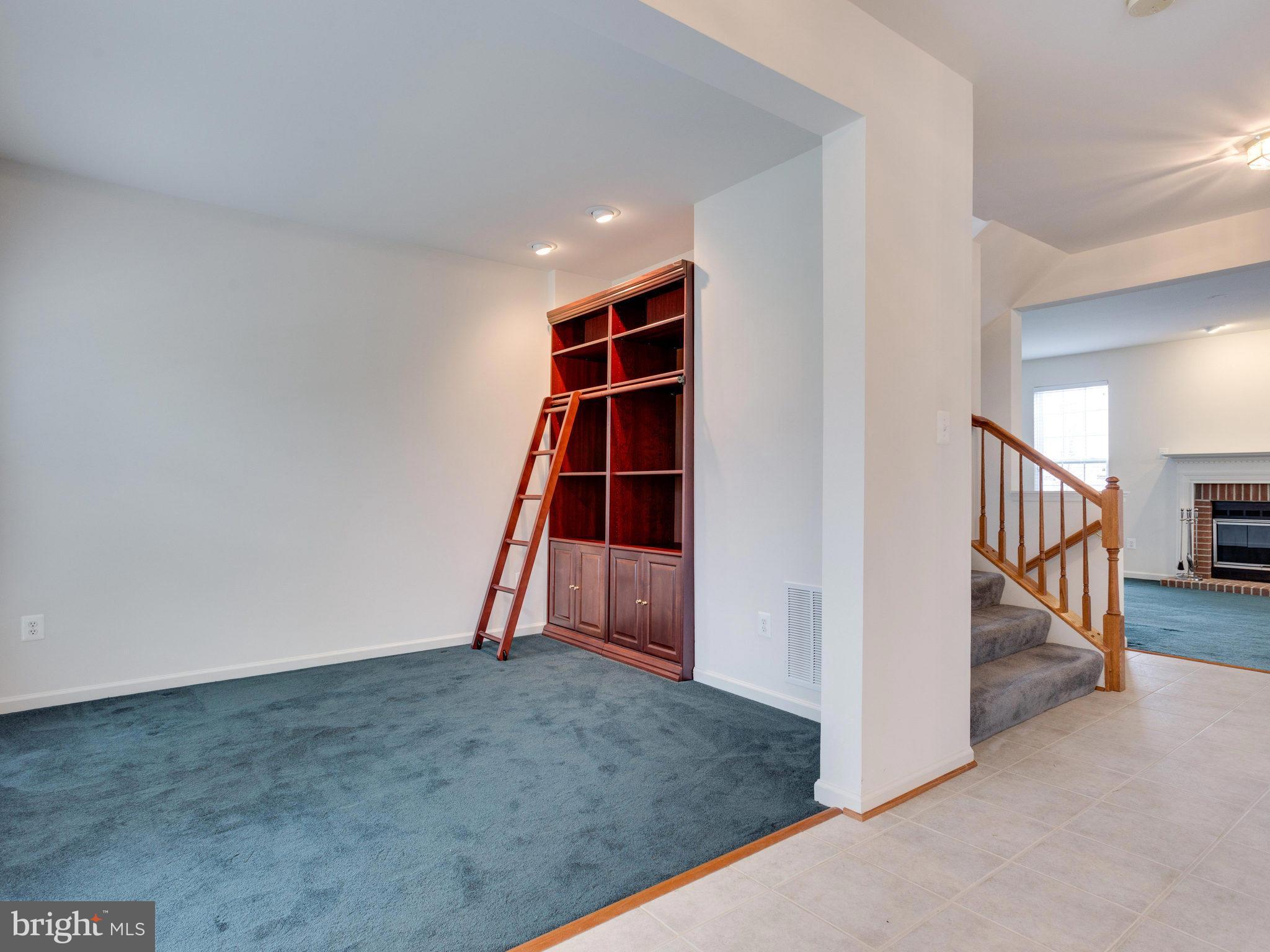 18411 Thundercloud Road Boyds, MD 20841 - Photo 2 of 30 a view of an empty room and stairs