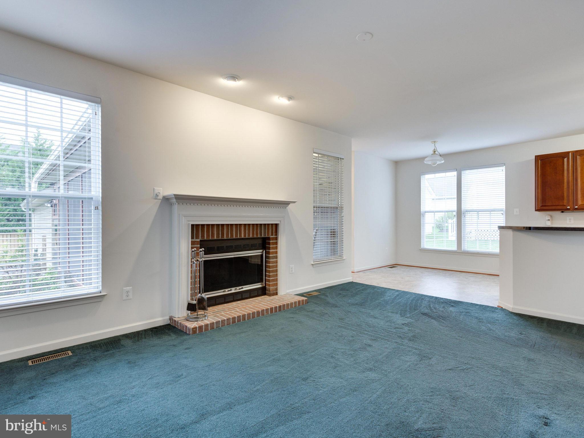 18411 Thundercloud Road Boyds, MD 20841 - Photo 11 of 30 a view of empty room with a fireplace