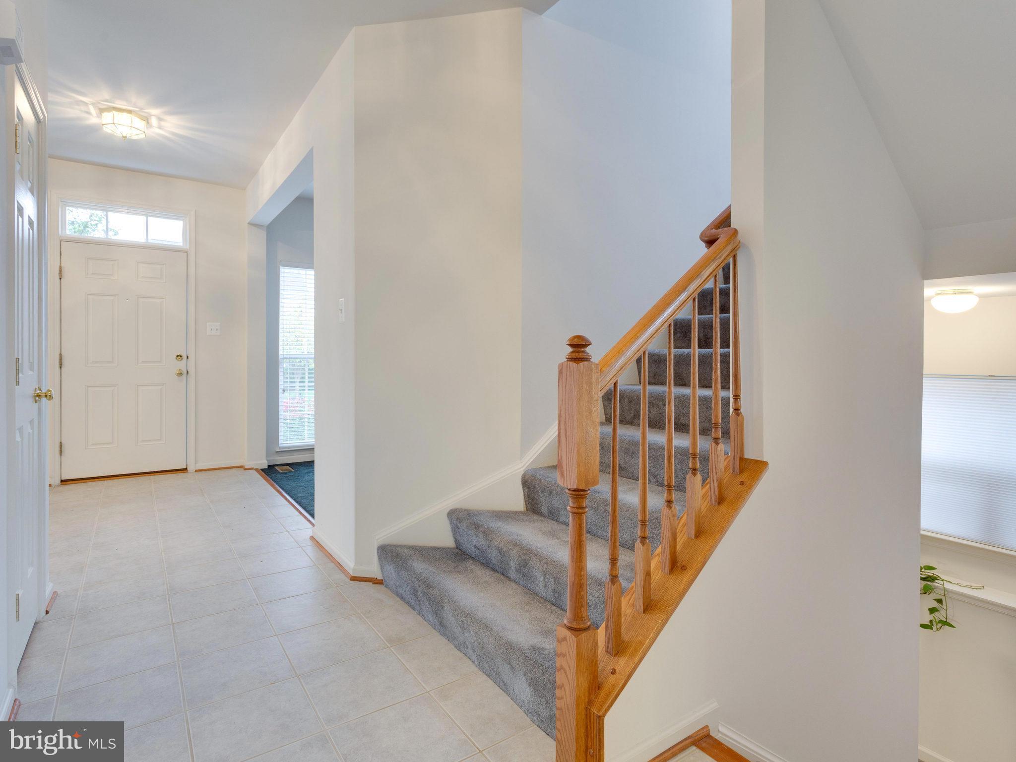 18411 Thundercloud Road Boyds, MD 20841 - Photo 13 of 30 a view of entryway with wooden floor
