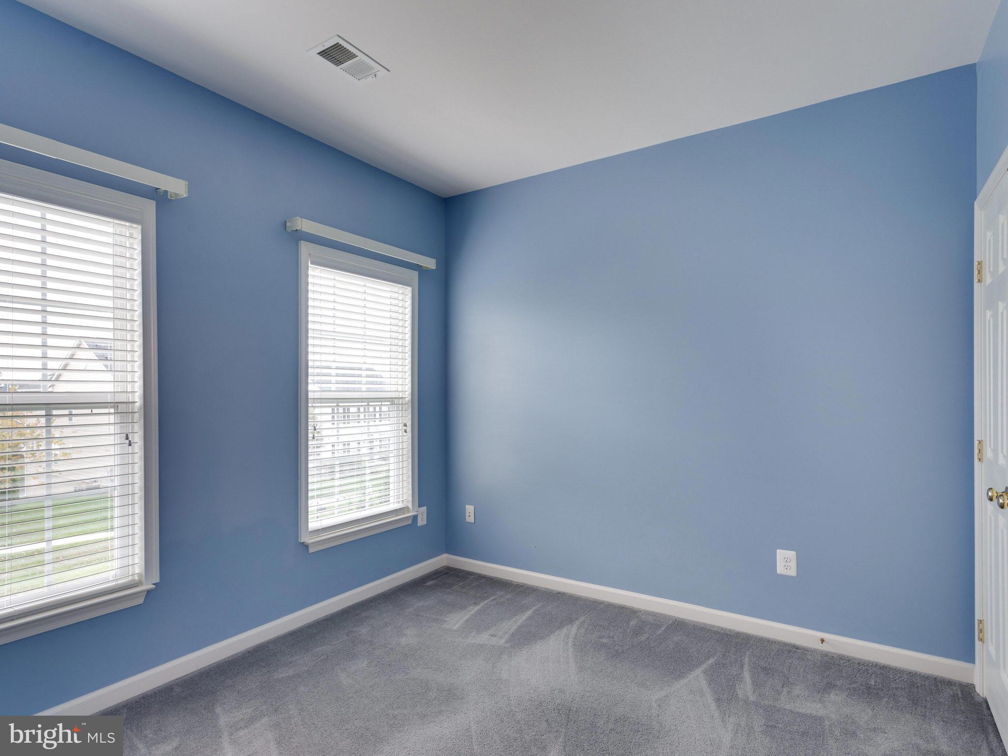 18411 Thundercloud Road Boyds, MD 20841 - Photo 19 of 30 an empty room with windows