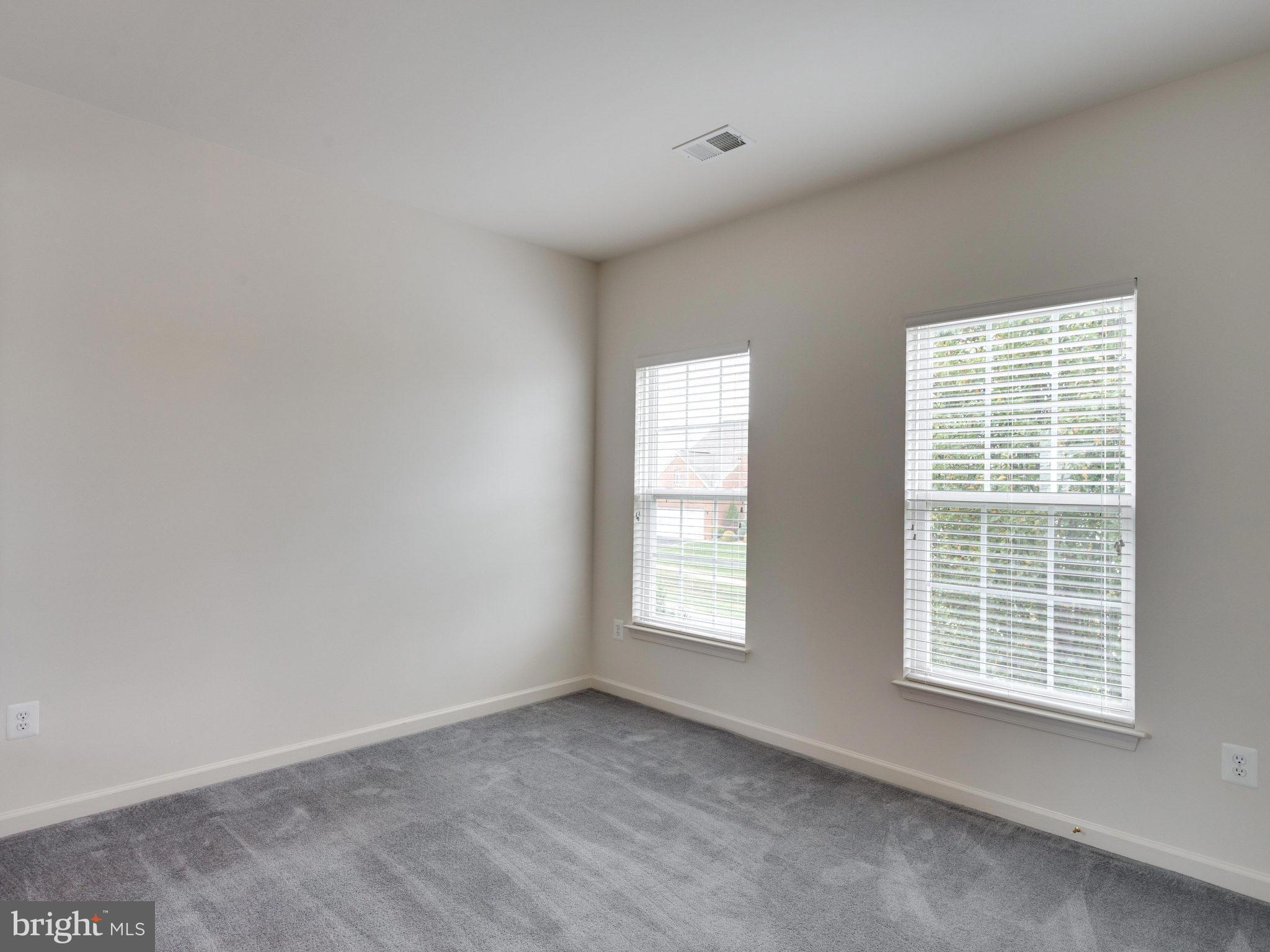 18411 Thundercloud Road Boyds, MD 20841 - Photo 20 of 30 an empty room with windows