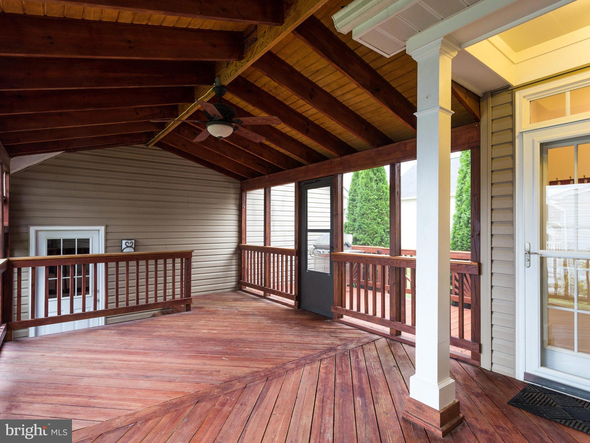 18411 Thundercloud Road Boyds, MD 20841 - Photo 26 of 30 a view of a deck with wooden floor and outdoor space