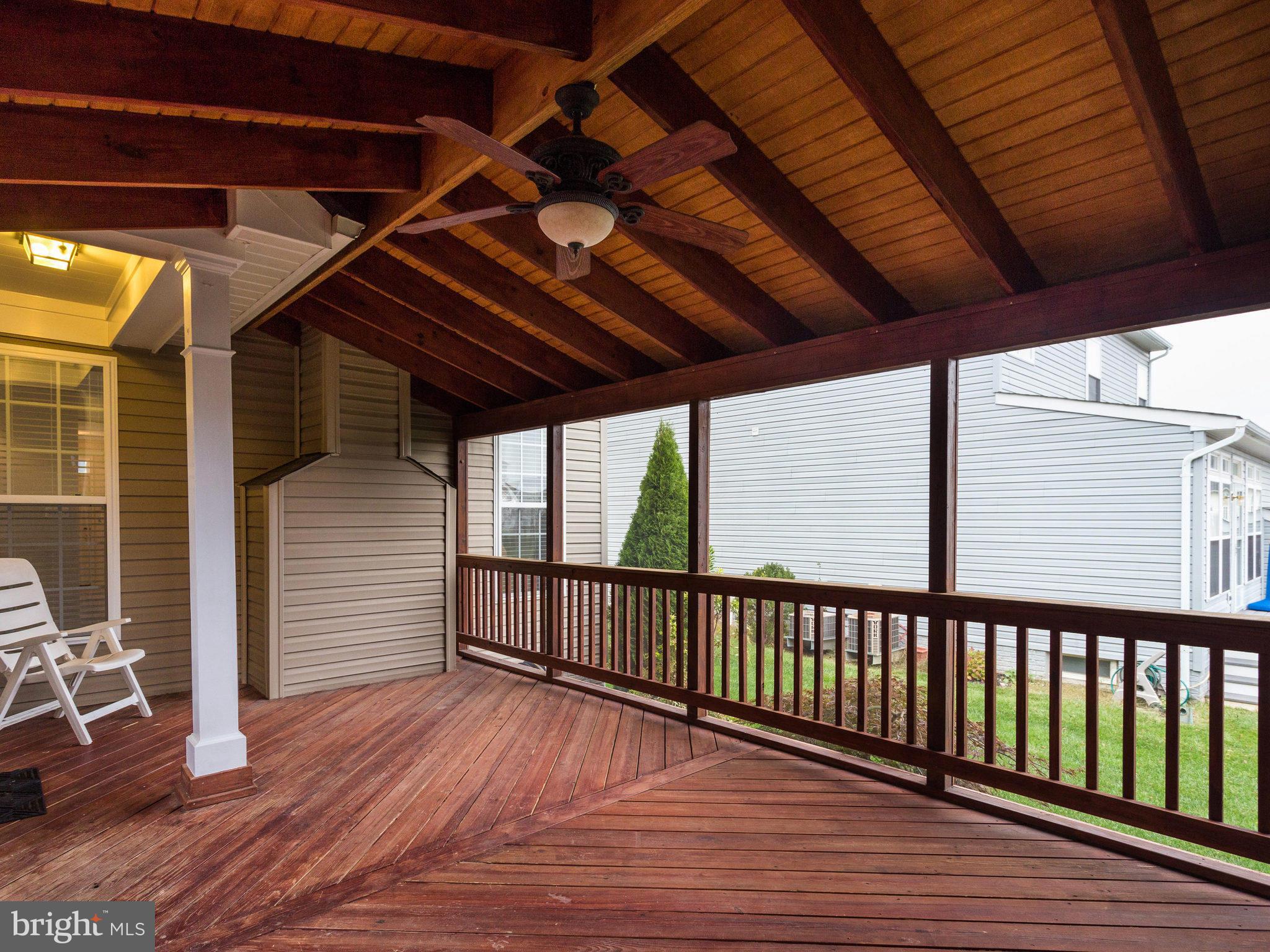 18411 Thundercloud Road Boyds, MD 20841 - Photo 27 of 30 a view of a balcony with wooden floor
