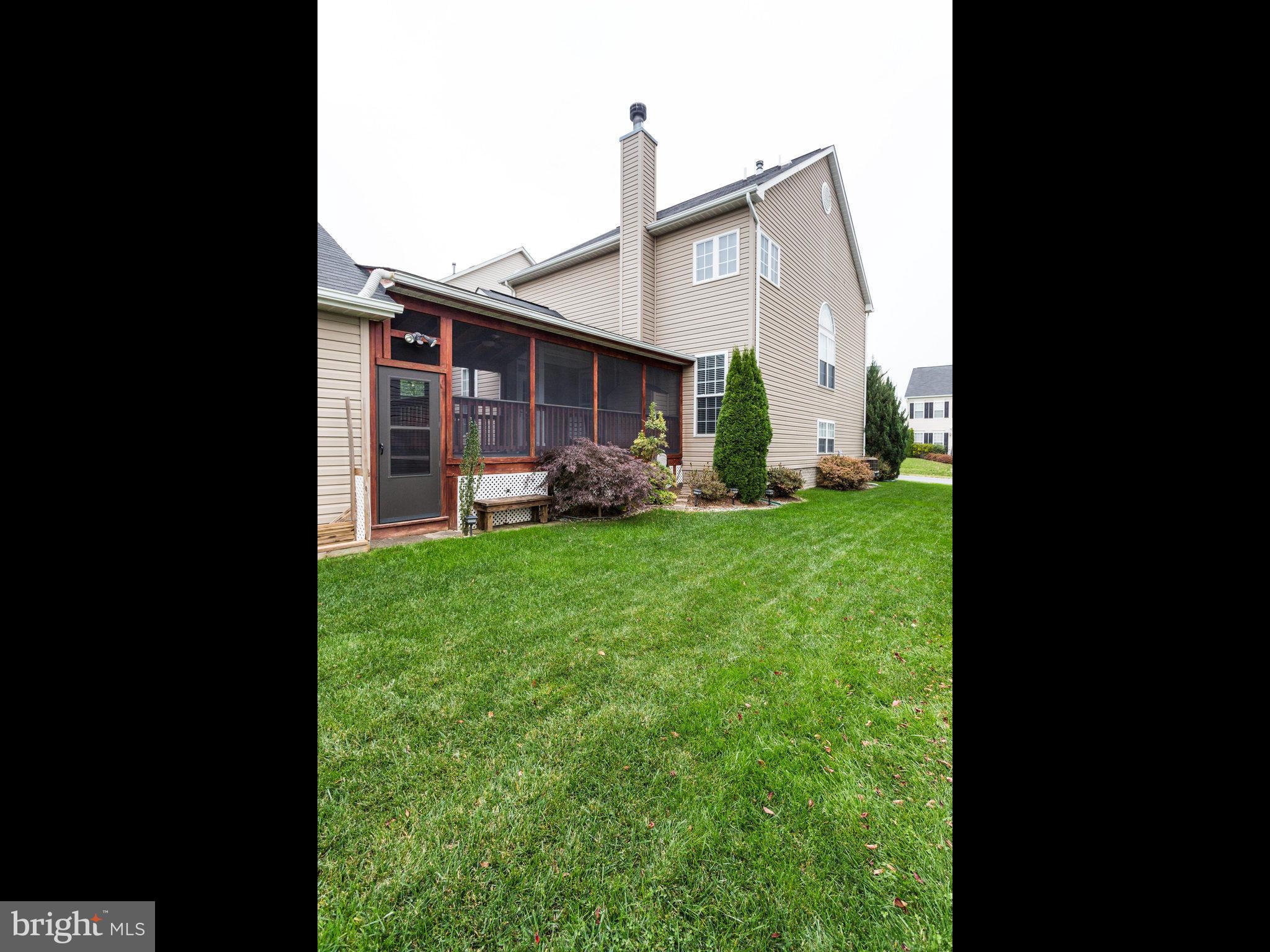 18411 Thundercloud Road Boyds, MD 20841 - Photo 29 of 30 a view of a house with backyard and garden