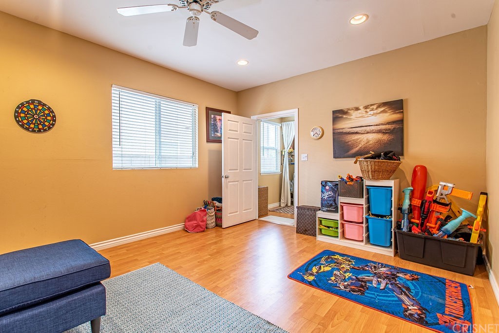25054 Oliver Way Stevenson Ranch, CA 91381 - Photo 18 of 53 a bed room with furniture and rug