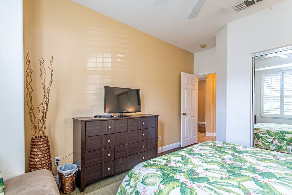25054 Oliver Way Stevenson Ranch, CA 91381 - Photo 22 of 53 a bedroom with a bed and a television