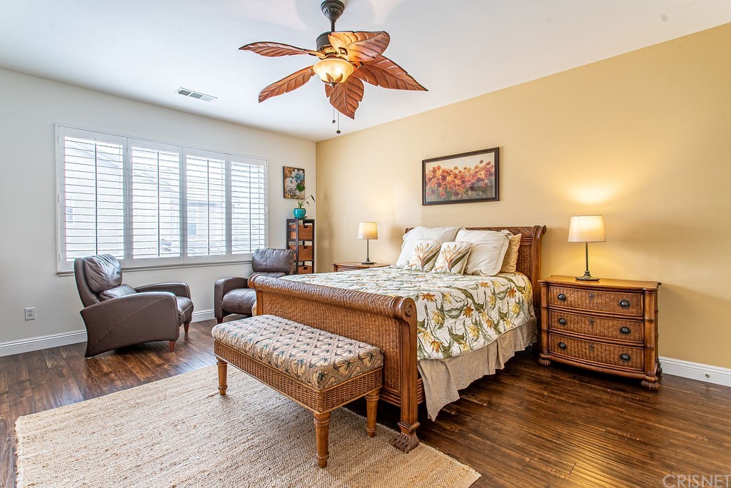 25054 Oliver Way Stevenson Ranch, CA 91381 - Photo 25 of 53 a bedroom with a bed and a couch