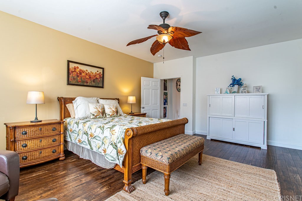 25054 Oliver Way Stevenson Ranch, CA 91381 - Photo 26 of 53 a bedroom with a bed and a dresser