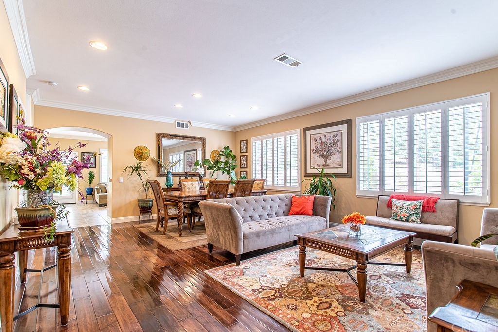 25054 Oliver Way Stevenson Ranch, CA 91381 - Photo 4 of 53 a living room with furniture and a large window