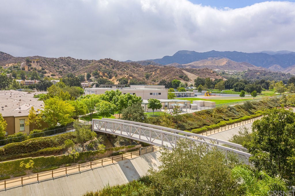 25054 Oliver Way Stevenson Ranch, CA 91381 - Photo 48 of 53 a view of a city with mountains in the background