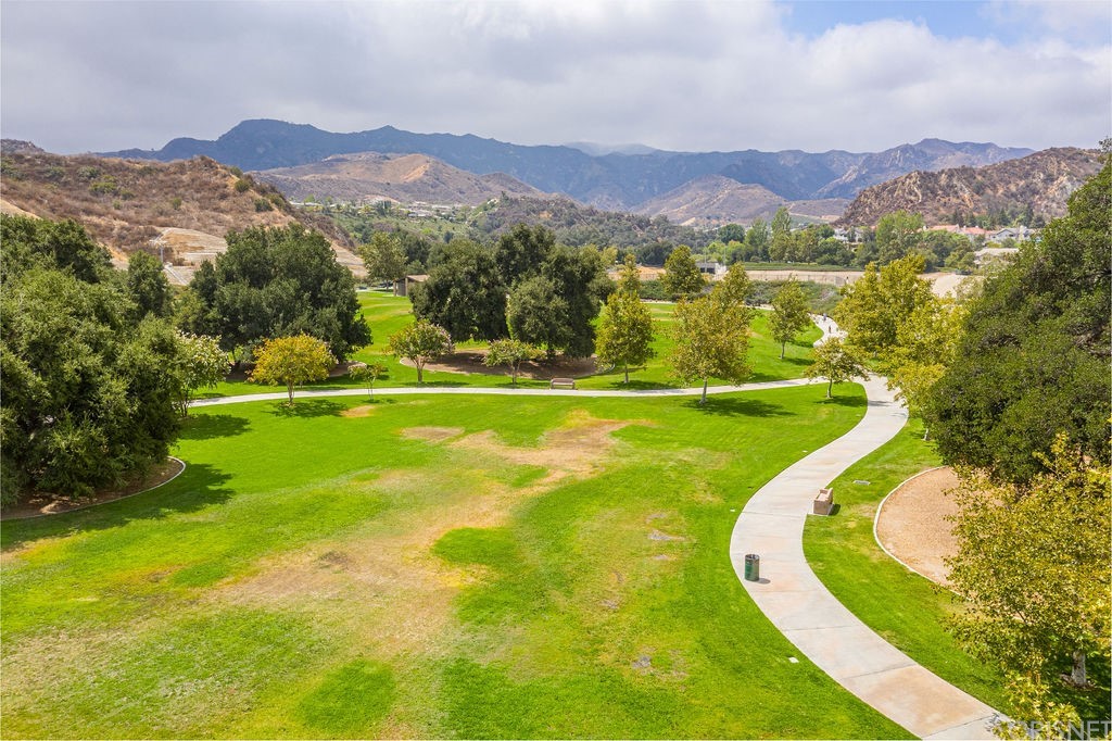 25054 Oliver Way Stevenson Ranch, CA 91381 - Photo 49 of 53 a view of a city with mountains in the background