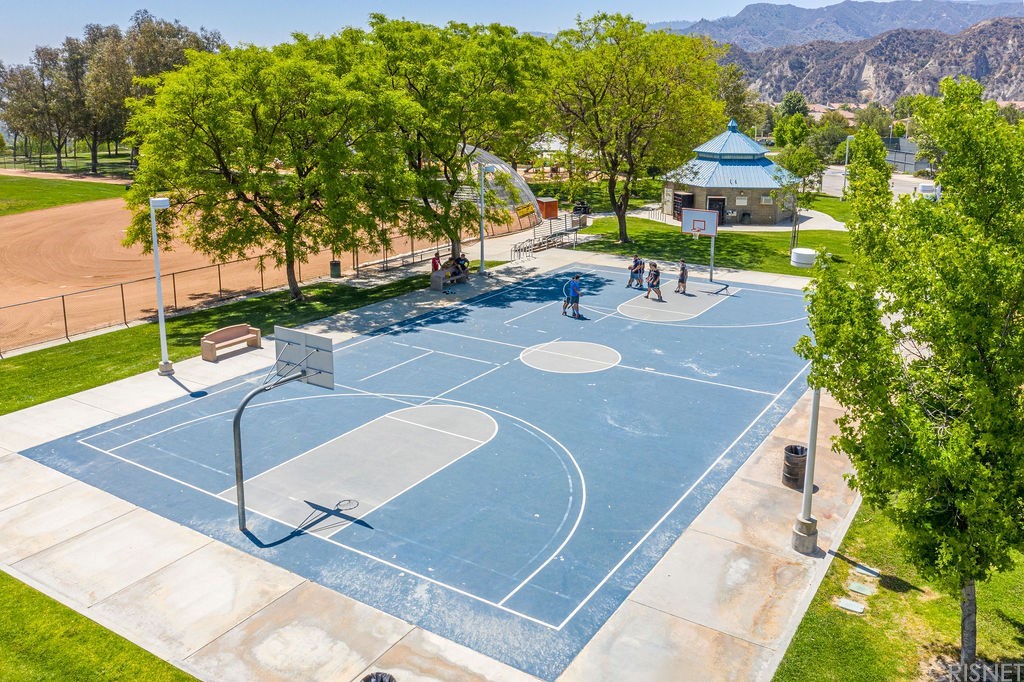 25054 Oliver Way Stevenson Ranch, CA 91381 - Photo 51 of 53 a view of a patio with a table and chairs
