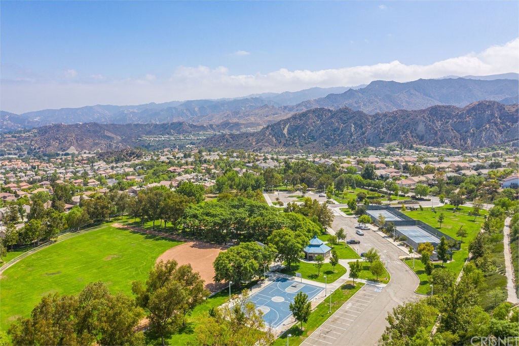 25054 Oliver Way Stevenson Ranch, CA 91381 - Photo 53 of 53 a view of a lush green hillside and houses