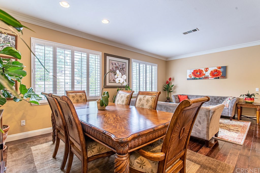 25054 Oliver Way Stevenson Ranch, CA 91381 - Photo 8 of 53 a view of a dining room with furniture window and outside view