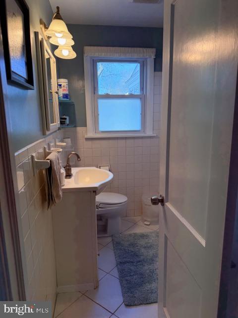 2511 Lindell Street Silver Spring, MD 20902 - Photo 15 of 21 a bathroom with a sink and a mirror