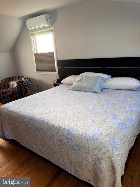 2511 Lindell Street Silver Spring, MD 20902 - Photo 21 of 21 a bedroom with a bed and window