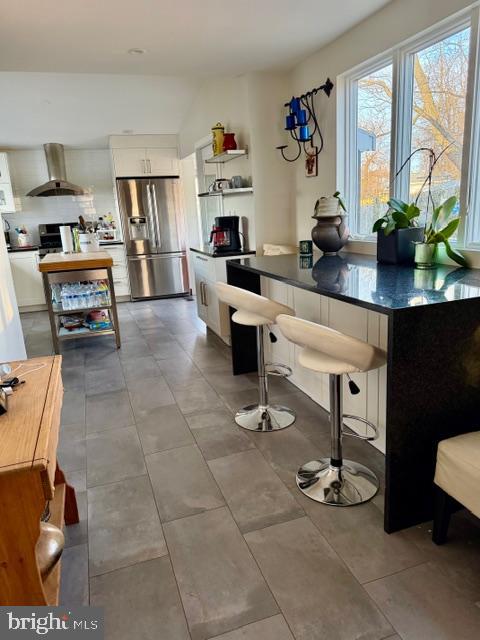2511 Lindell Street Silver Spring, MD 20902 - Photo 6 of 21 a living room with furniture a rug and a window