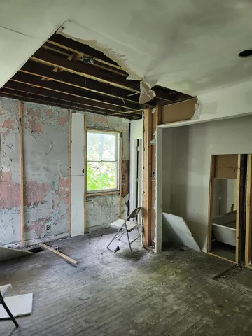 a bathroom with a sink and mirror