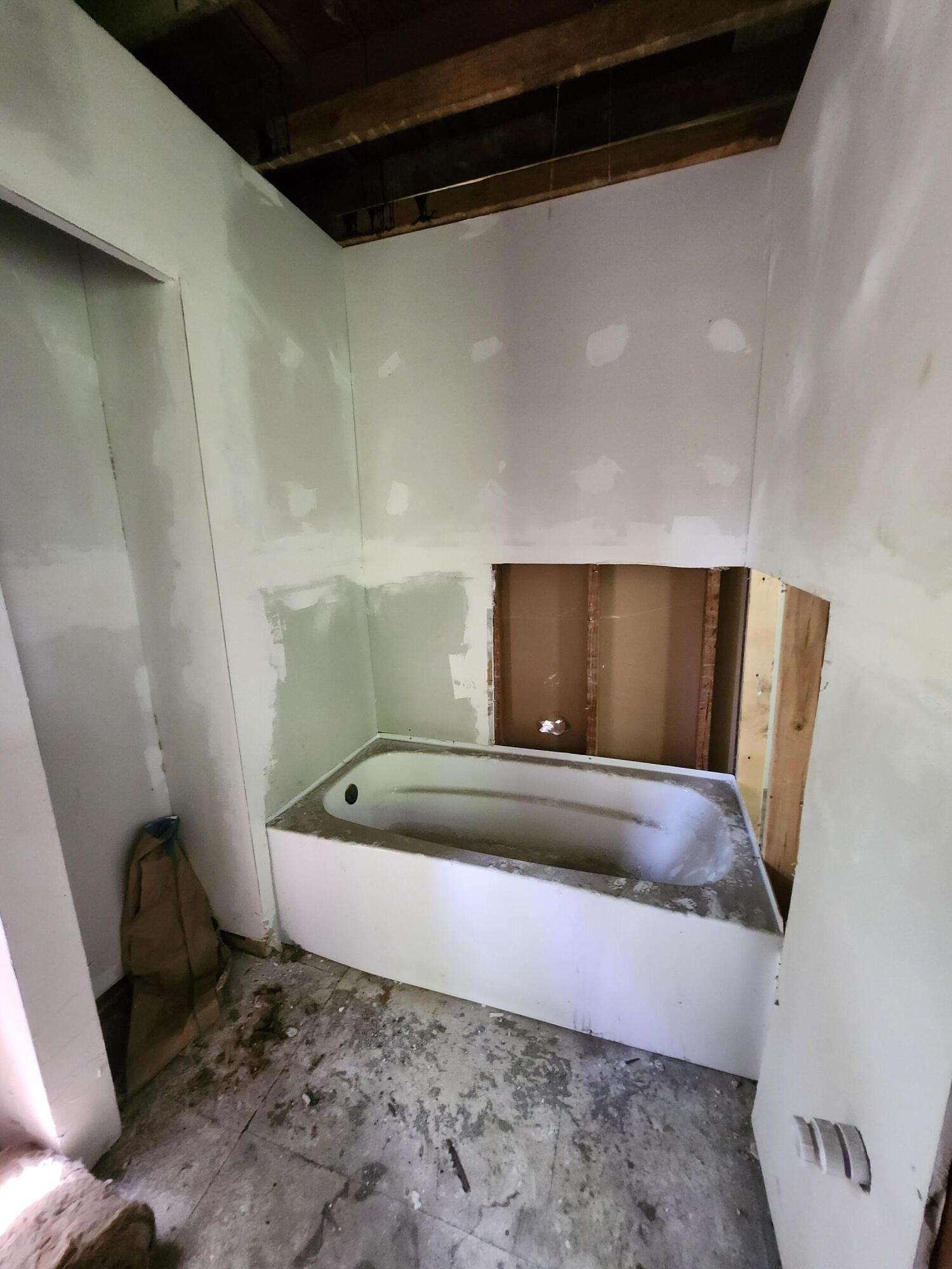 627 Tennessee Street Gary, IN 46402 - Photo 20 of 28 a bathroom with a sink and mirror