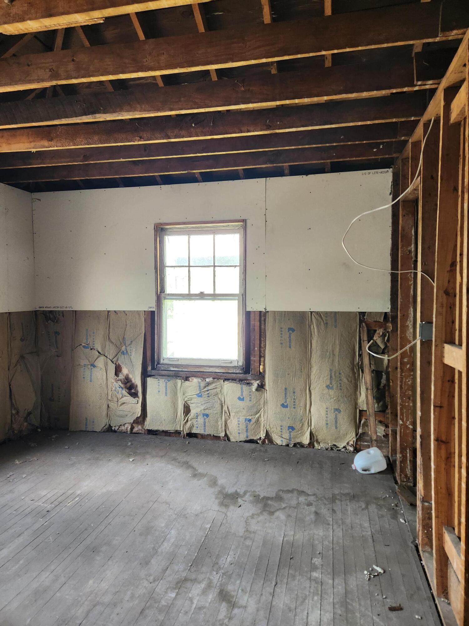 627 Tennessee Street Gary, IN 46402 - Photo 7 of 28 a view of empty room with windows