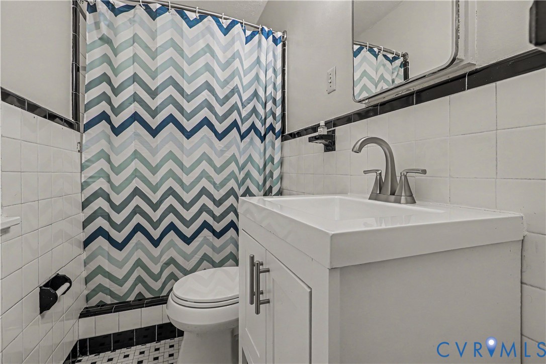 4803 Coleman Road Richmond, VA 23230 - Photo 26 of 54 White vanity with brushed nickel hardware, integra
