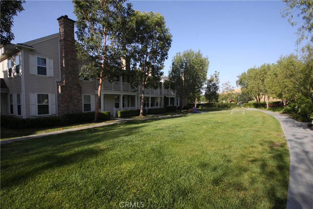 11 Rumford Street Ladera Ranch, CA 92694 - Photo 18 of 24 a backyard of a house with lots of green space and outdoor seating