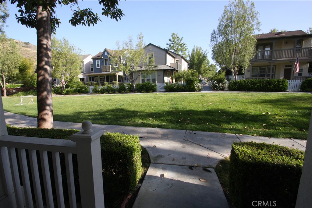 11 Rumford Street Ladera Ranch, CA 92694 - Photo 19 of 24 a view of a garden with a house in the background
