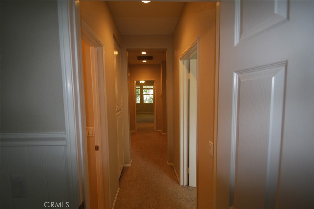 11 Rumford Street Ladera Ranch, CA 92694 - Photo 23 of 24 a view of a bathroom from a hallway