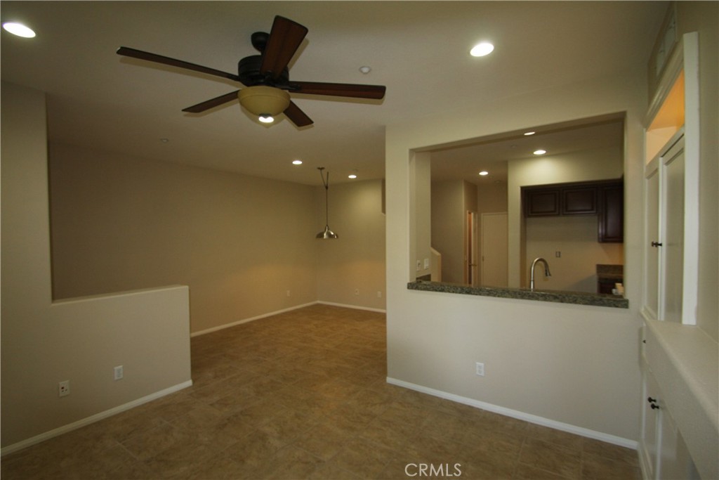 11 Rumford Street Ladera Ranch, CA 92694 - Photo 5 of 24 en empty room with wooden floor and windows