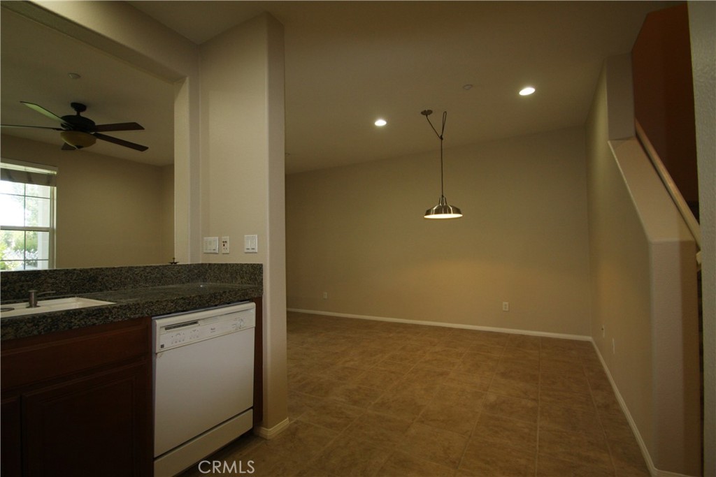 11 Rumford Street Ladera Ranch, CA 92694 - Photo 9 of 24 a kitchen with a sink and cabinets