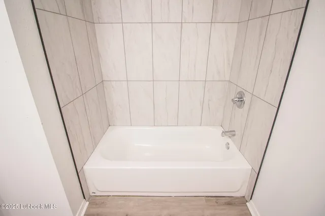 a bathroom with a bathtub