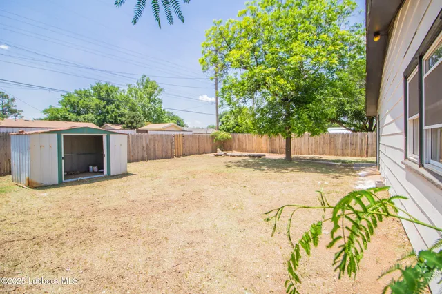 a house with swimming pool in front of it