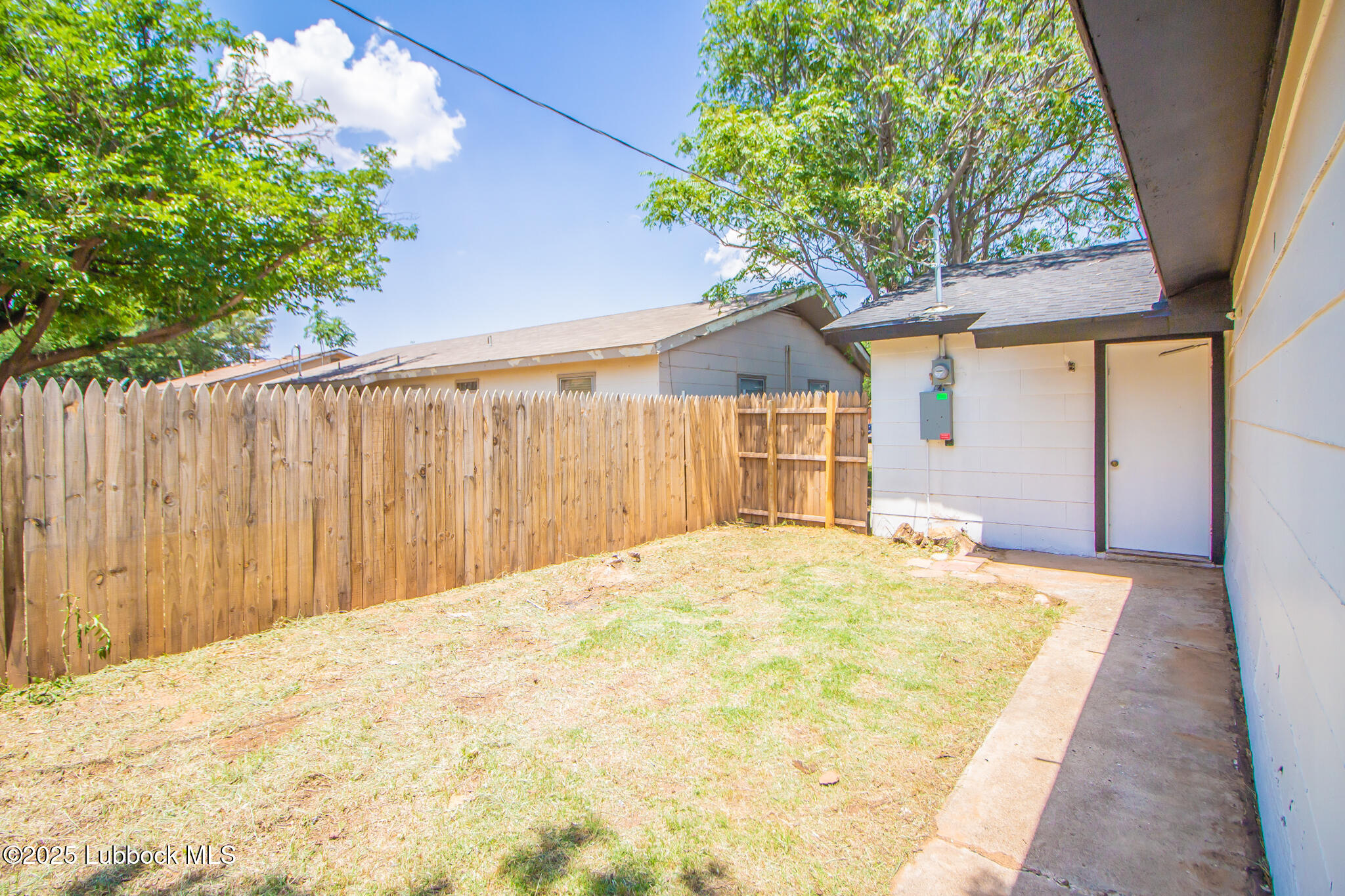5313 39th Street Lubbock, TX 79414 - Photo 30 of 30 a view of a backyard of the house