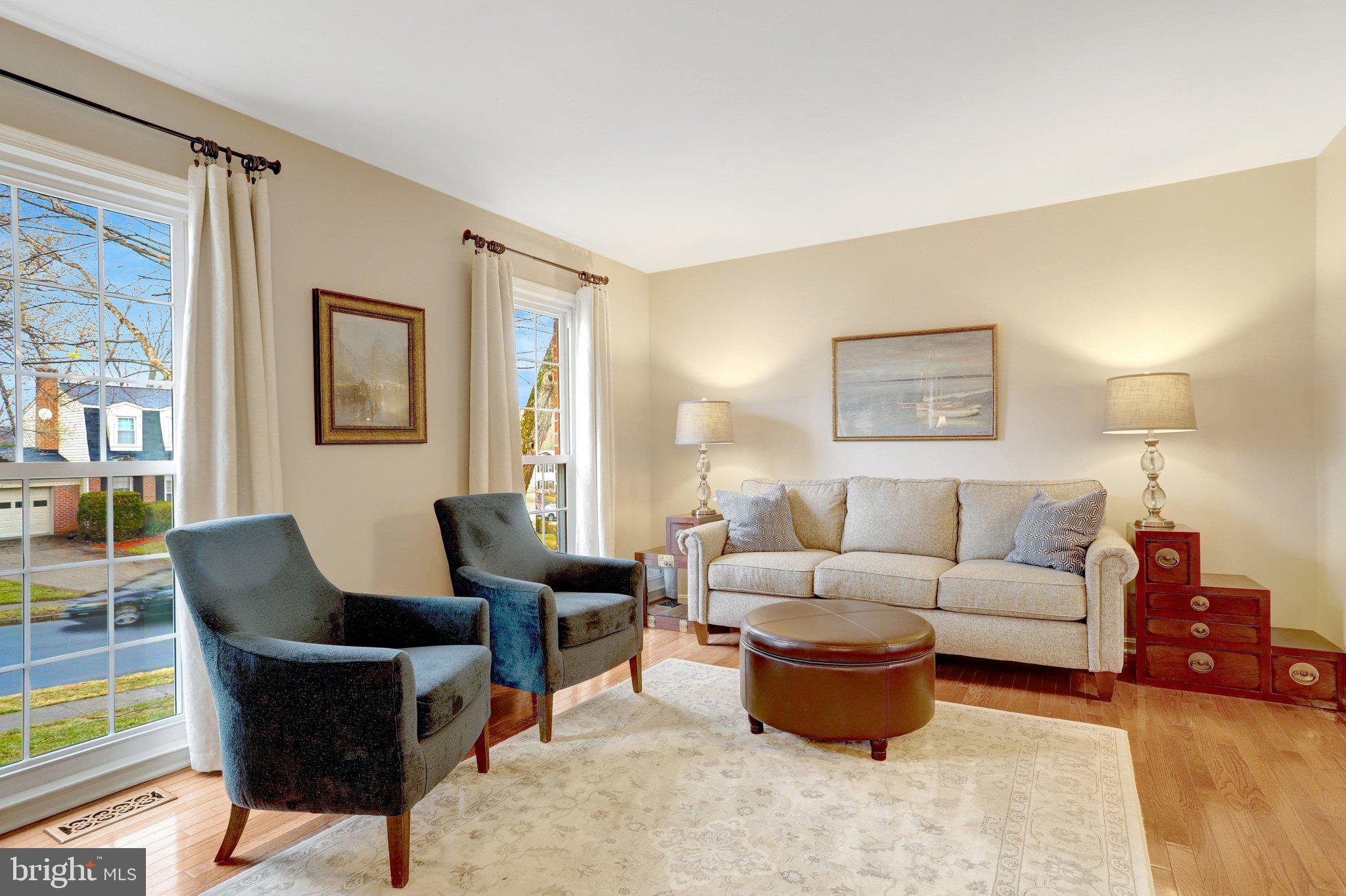 8705 Side Saddle Road Springfield, VA 22152 - Photo 11 of 73 a living room with furniture and a large window