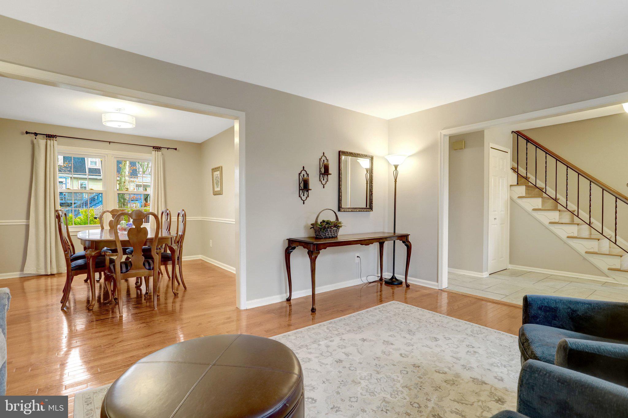 8705 Side Saddle Road Springfield, VA 22152 - Photo 12 of 73 a living room with furniture and a table