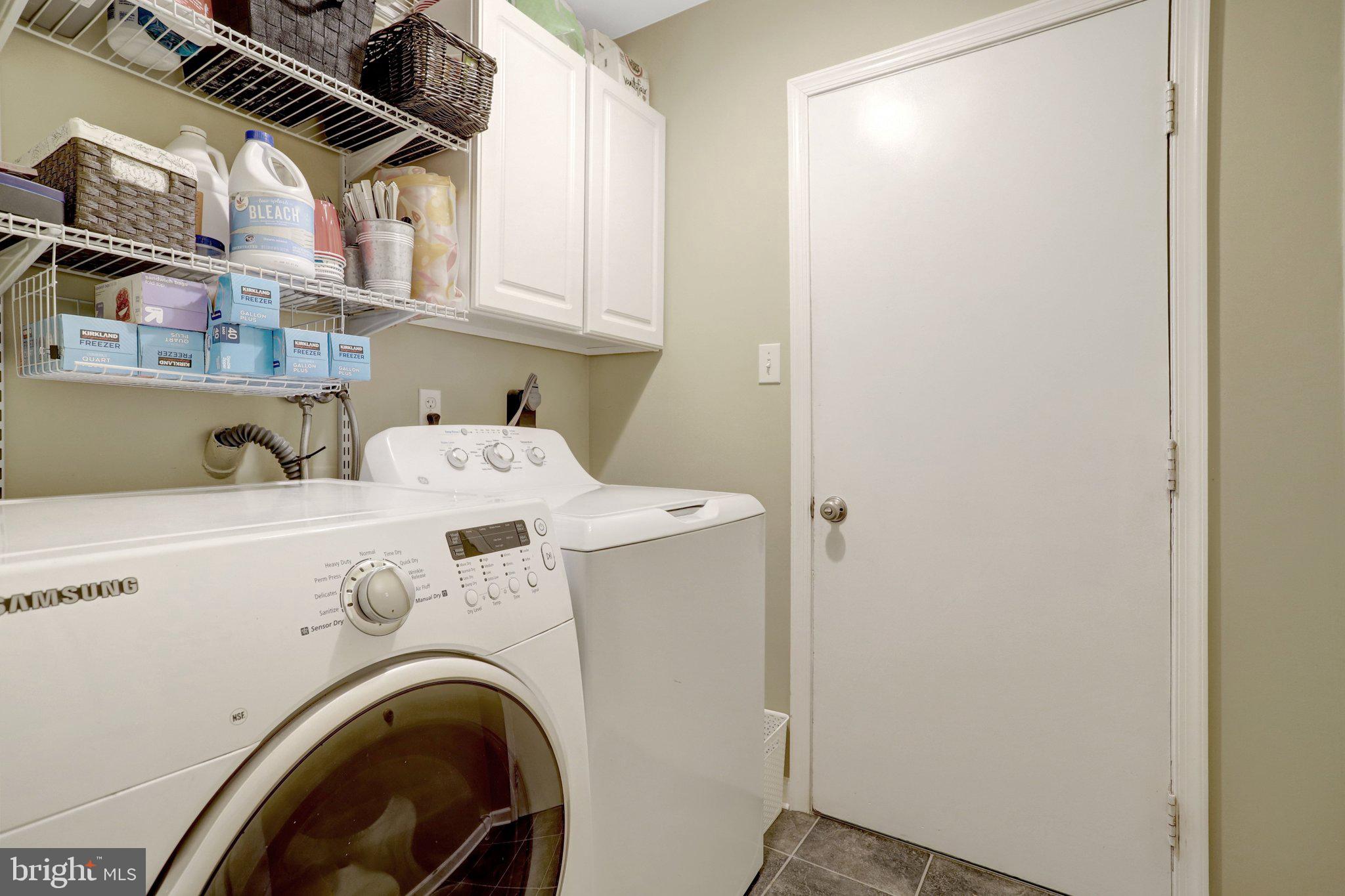 8705 Side Saddle Road Springfield, VA 22152 - Photo 28 of 73 a utility room with dryer and washer