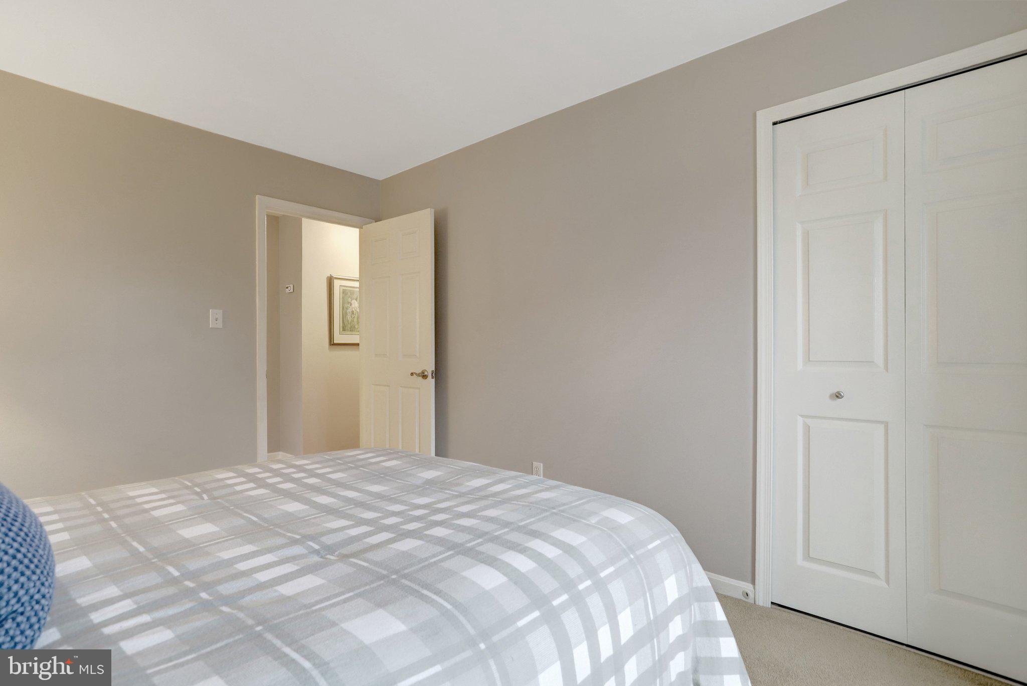 8705 Side Saddle Road Springfield, VA 22152 - Photo 37 of 73 a bedroom with a bed and a window