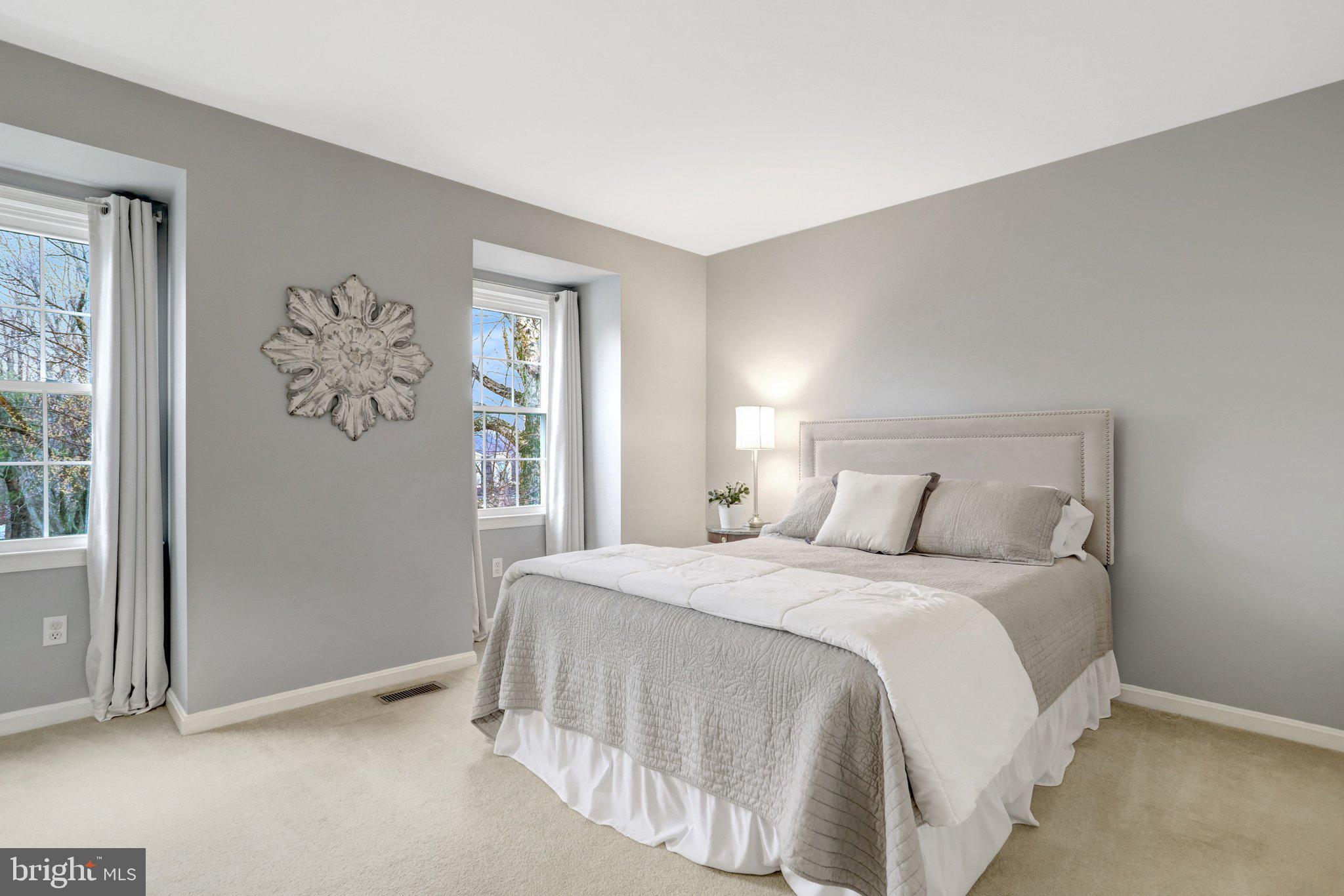 8705 Side Saddle Road Springfield, VA 22152 - Photo 40 of 73 a bedroom with a bed and a window