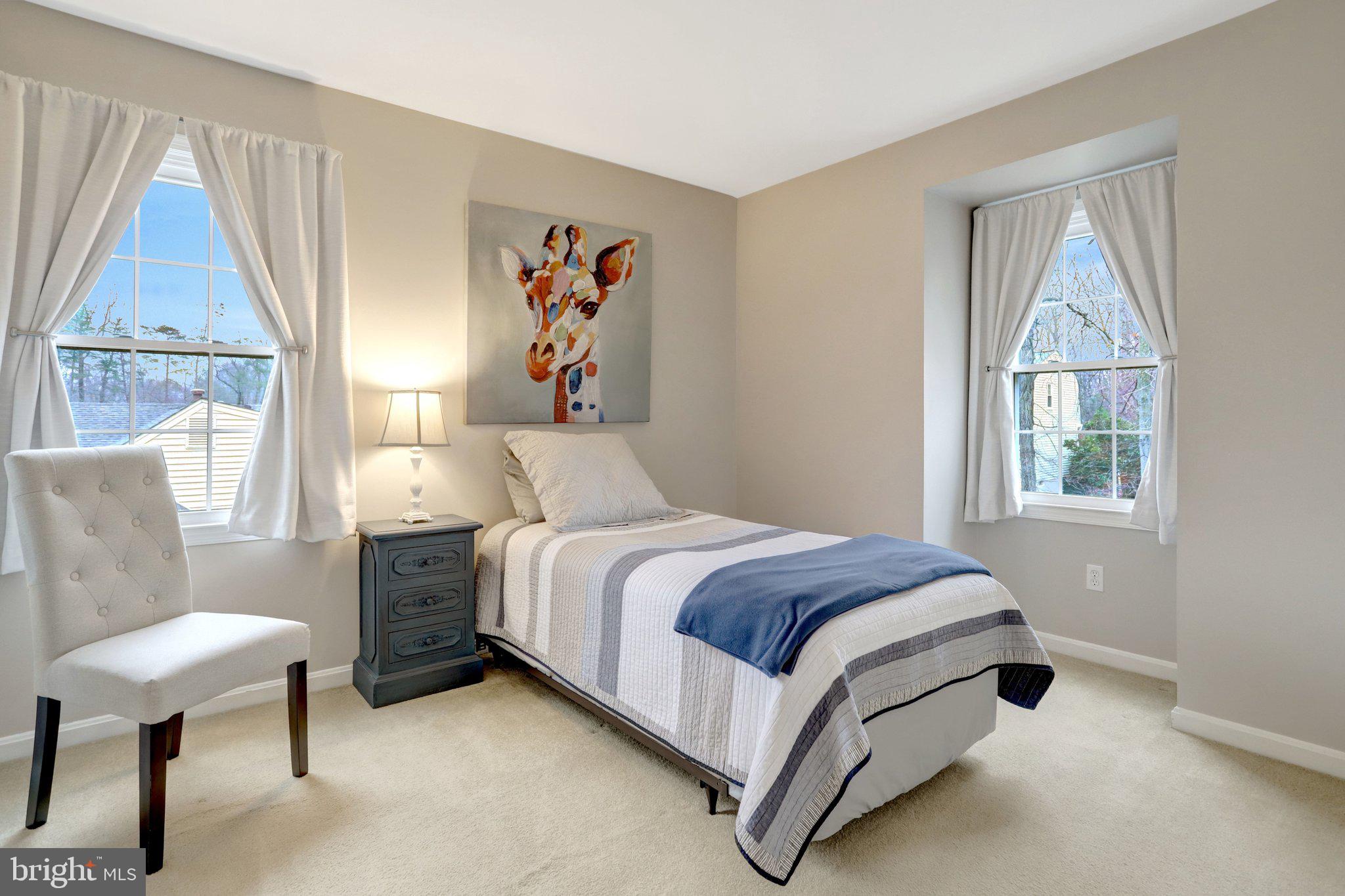 8705 Side Saddle Road Springfield, VA 22152 - Photo 43 of 73 a bedroom with a bed and a window