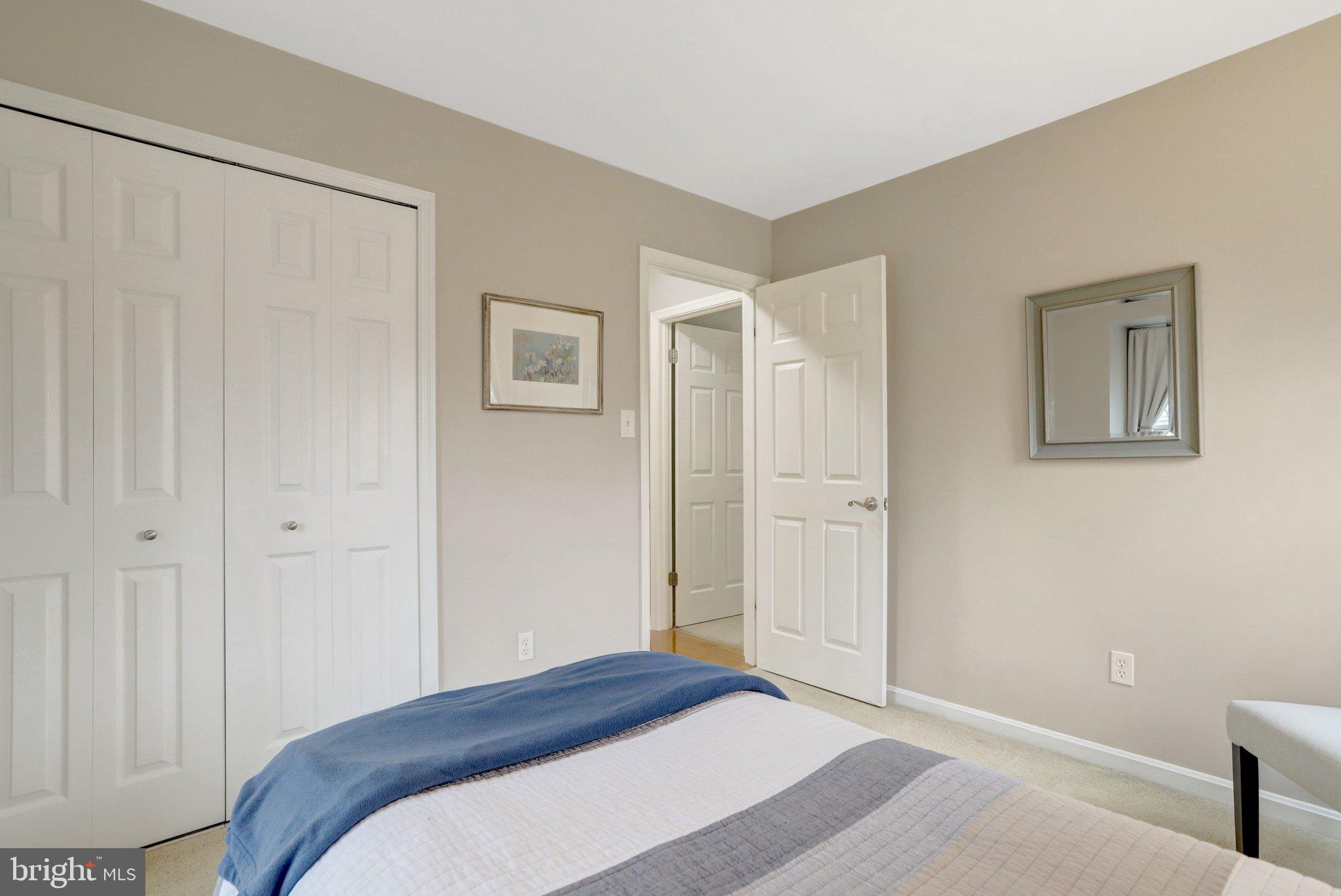 8705 Side Saddle Road Springfield, VA 22152 - Photo 44 of 73 a bedroom with a bed and a window