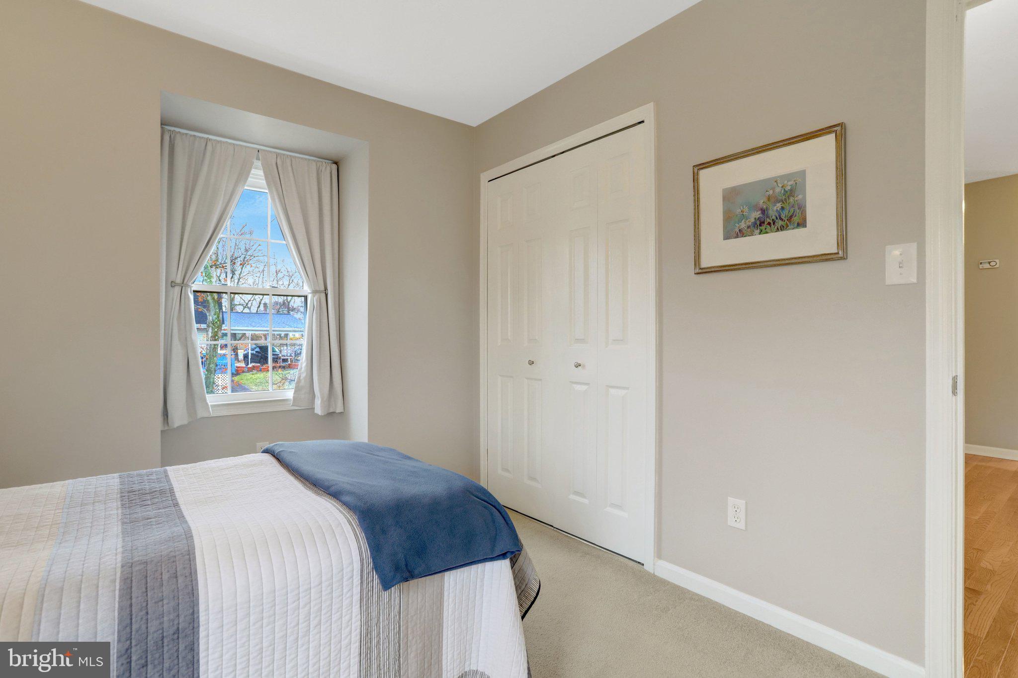 8705 Side Saddle Road Springfield, VA 22152 - Photo 46 of 73 a bedroom with a bed and a window