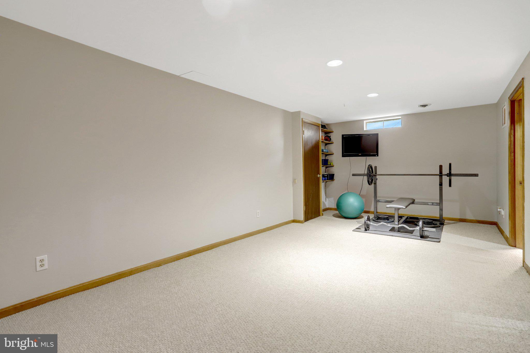 8705 Side Saddle Road Springfield, VA 22152 - Photo 53 of 73 a view of a room with gym equipment