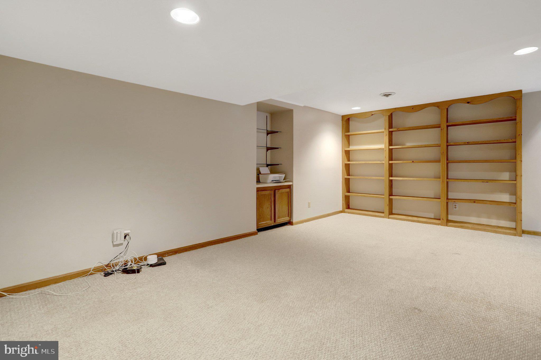 8705 Side Saddle Road Springfield, VA 22152 - Photo 55 of 73 a view of an empty room with a window