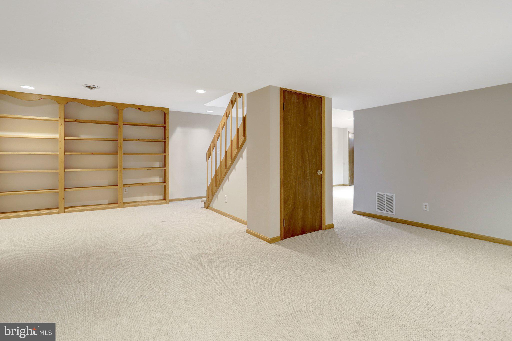 8705 Side Saddle Road Springfield, VA 22152 - Photo 56 of 73 a view of an empty room with a garage