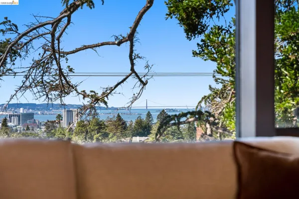 a living room with furniture a chandelier