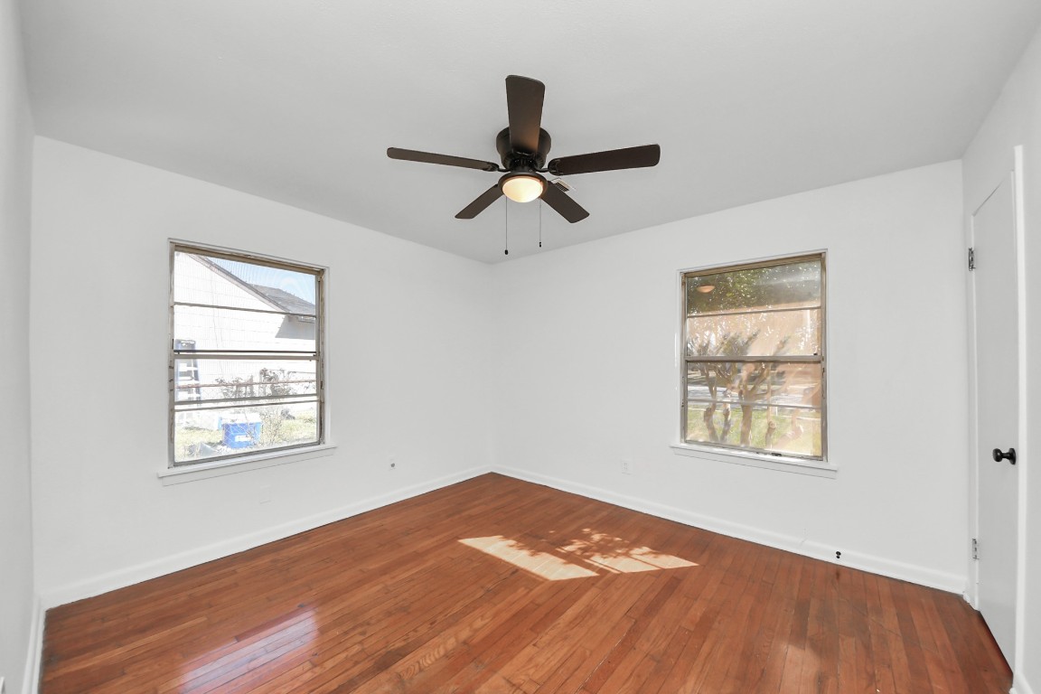 201 Delta Street Pasadena, TX 77506 - Photo 19 of 33 a view of a room with a window and a ceiling fan